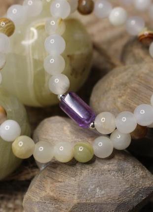 Браслети из оникса и аметиста.