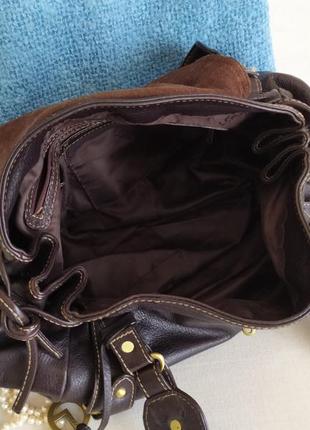 Коричневая кожаная сумка мешок завязки l. credi8 фото