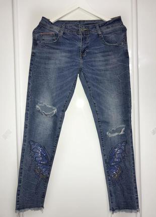 Джинсы в обтяжку