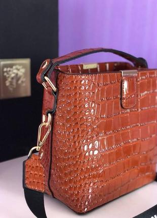 Жіноча шкіряна лакова сумка руда2 фото