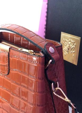 Жіноча шкіряна лакова сумка руда3 фото