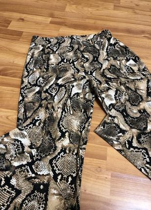 Лосини з принт змії