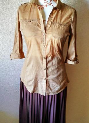 Тоненька блуза з трикотажними вставками