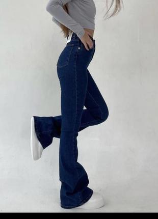Джинси кльош висока посадка сині круті джинси3 фото