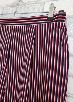 Стильні вільні брюки в смужку5 фото