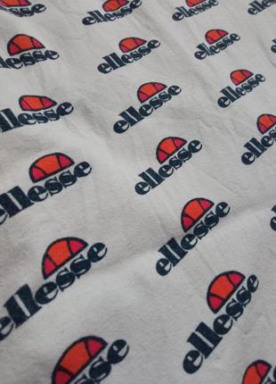 Монограмна біла футболка ellesse з горлом стойкою3 фото