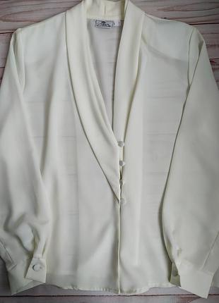 Красива офісна блуза з v-подібним вирізом