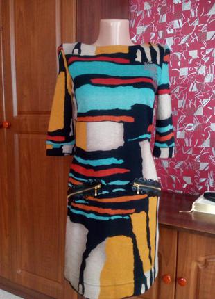 Сукня-міні з декоративними замочками на кишенях.2 фото