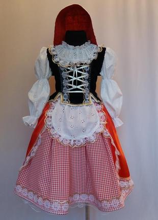 Карнавальный костюм красной шапочки.