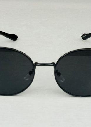 Gucci очки унисекс солнцезащитные овальные черные в черном металле2 фото