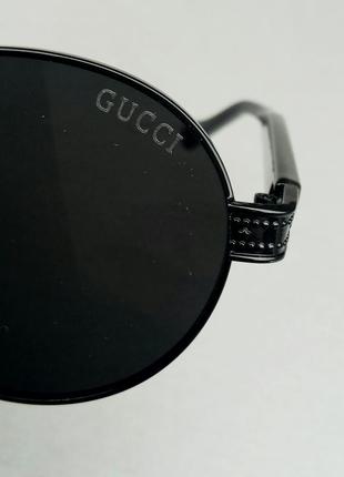 Gucci очки унисекс солнцезащитные овальные черные в черном металле8 фото