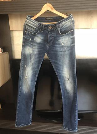 Фірмові джинси