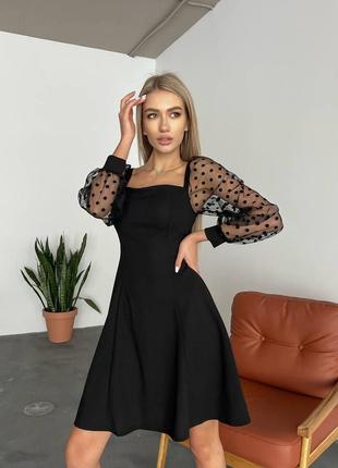 Чорна сукня з рукавами в сіточку