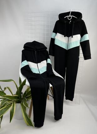 Трикотажний суцільний комбінезон з капюшоном