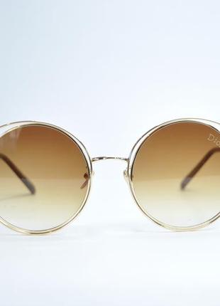 Окуляри жіночі сонцезахисні