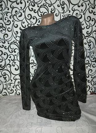 Шикарне мерехтливе чорне плаття