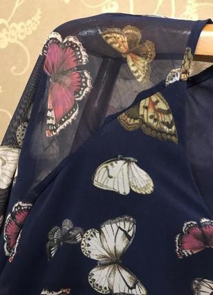 Нереально красивая и стильная брендовая блузка в бабочках.4 фото