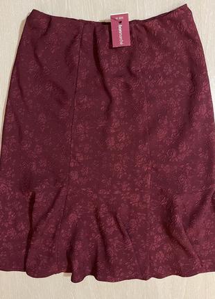 Очень красивая и стильная брендовая юбка-миди в цветах.4 фото