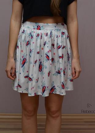 Нереально красивая и стильная брендовая юбка в птичках.4 фото