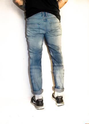Стильные зауженные джинсы с дырками river island2 фото