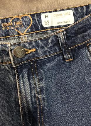 Расклешенные трендовые джинсы известной фирмы3 фото