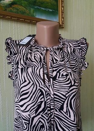 New look красивая женственная майка блуза  с рюшами принт зебра цвет бежевый/черный4 фото