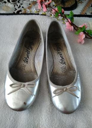 Туфлі.