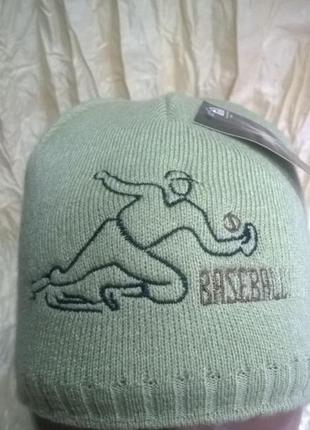 Оливковая  спортивная   шапка демисезонная2 фото