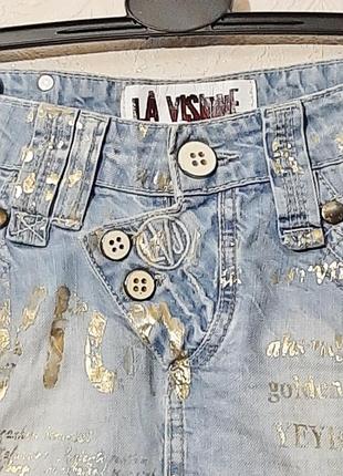 Оригинальная брендовая юбка джинсовая голубая с молниями и золотистыми словами мини женская коттон4 фото