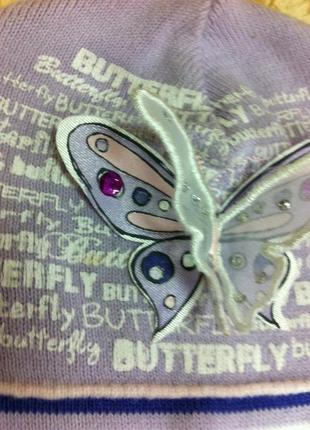 Демісезонна бавовняна одинарна шапочка з метеликом до 3 років2 фото