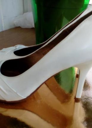 Шкіряні білі туфлі2 фото