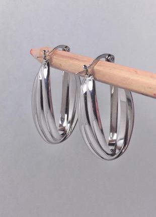 Сережки сережки сережки об'ємні об'ємні широкі овальні круглі довгі під срібло, срібні сріблясті1 фото
