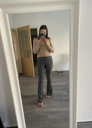 Штани  у рубчик кльош