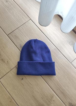 Тепла темно-синя шапка трикотажна унісекс