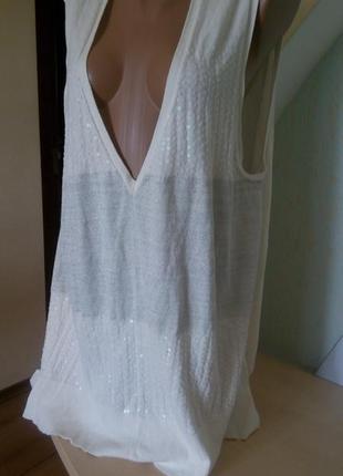 Отличная трикотажная молочная блуза с паетками3 фото