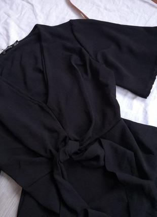 Красивая черная блузка на запах с бантом2 фото