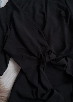 Красивая черная блузка на запах с бантом4 фото