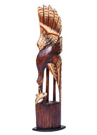 Статуэтка деревянная птица журавль с рыбкой высота 60см1 фото