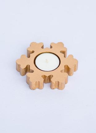 Підсвічник дерев'яний сніжинка золотистого кольору діаметр 15 см1 фото