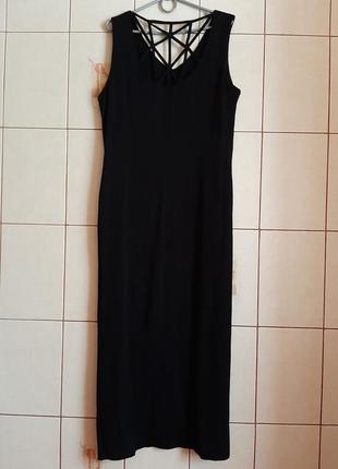 Стильное черное платье с акцентом из перламутровых пуговиц и разрезом из вискозы от everyday8 фото