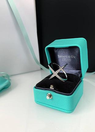 Срібне кільце у вигляді хрестика