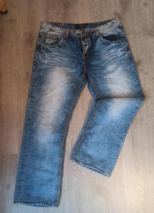Джинсы мужские