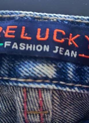 Жіночі джинсові шорти з потертостями3 фото