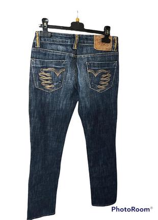 Тёмные джинсы с декорированными карманами италия6 фото