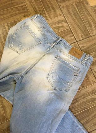 Итальянские рваные джинсы с шипами!3 фото