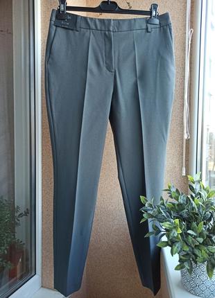 Классические качественные серые брюки зауженные к низу1 фото