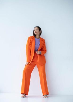 Классический женский костюм в деловом стиле брюки и пиджак, оранжевый 44, 46, 48, 50