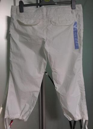Легкие натуральные белые бриджи (шорты до колен)3 фото