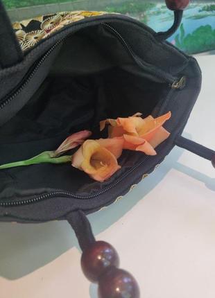 Текстильна сумка маленька чорна розшита квітами 22*15*105 фото