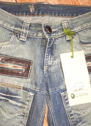 Распродаю срочно!!! интересные новые джинсовые шорты - капри!!4 фото